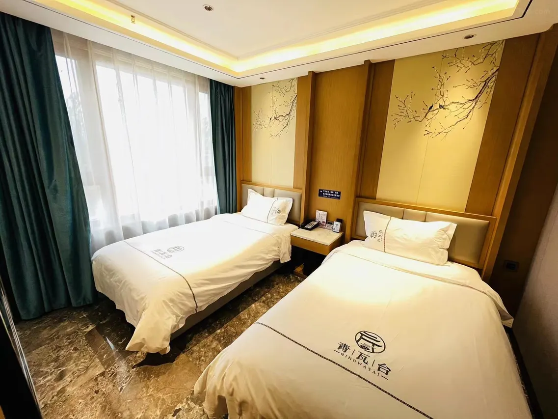 Tangquan Business Hotel Qingwatai